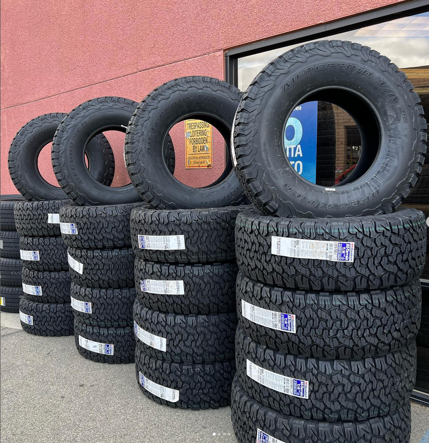 A bunch of tires are stacked on top of each other