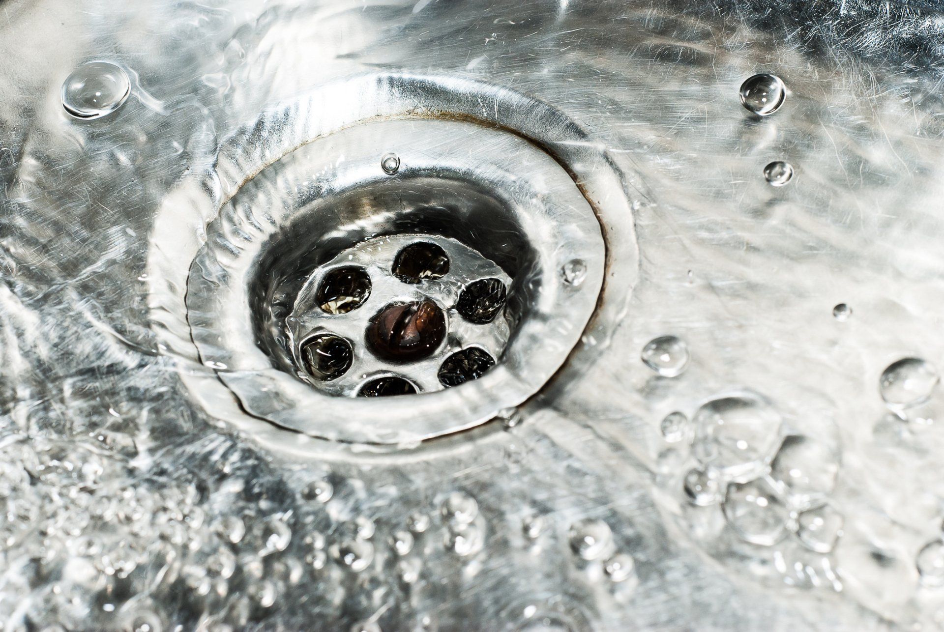 Sink with Water — Hillsborough, NC — Chambers Plumbing & Piping Inc