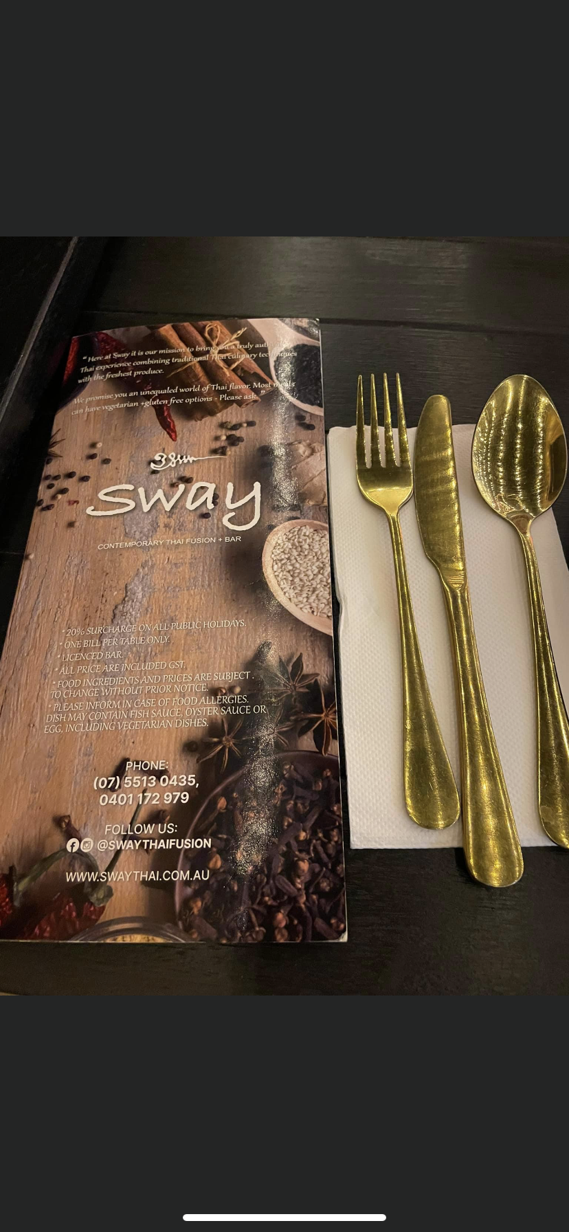 A Place Setting At A Table With Gold Cutlery — Sway Thai Fusion & Bar In Tweed Heads South, NSW