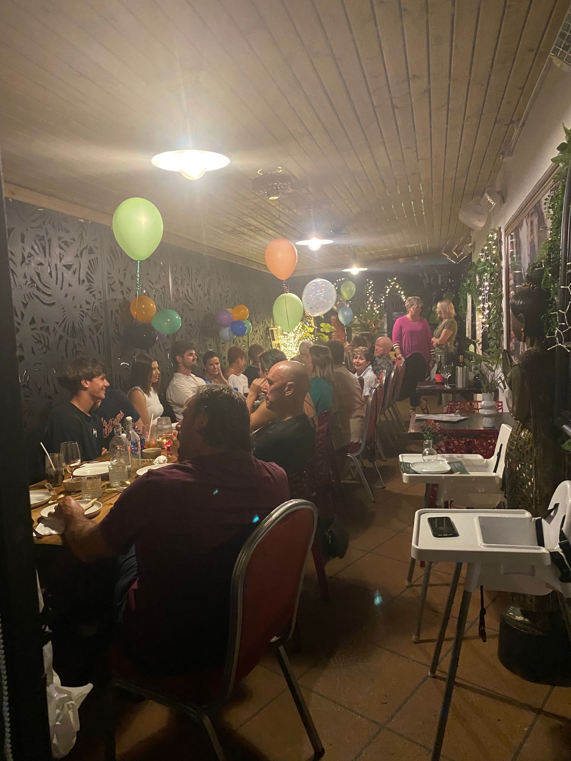 People Sitting Around a Table With Balloons — Sway Thai Fusion & Bar In Tweed Heads South, NSW