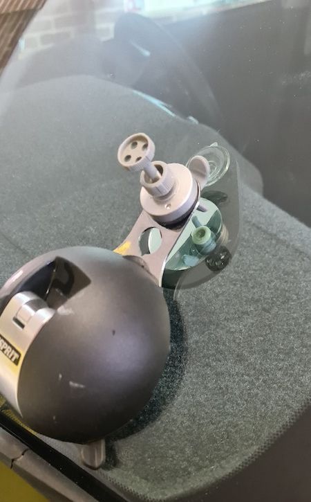 A Close Up of a Windshield With a Device on It — MJR Auto Glass In Bowral, NSW