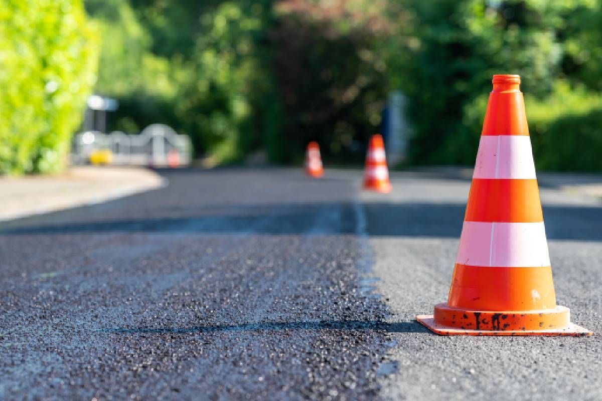 Asphalt surface being repaired near Richmond and Lexington, Kentucky (KY)