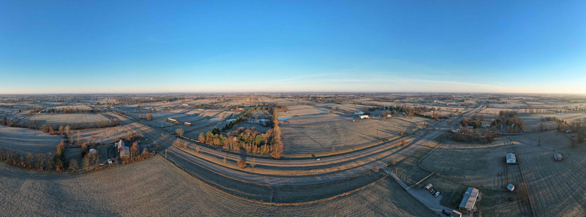 A panoramic view of Paris Pike, Kentucky (KY), including farms