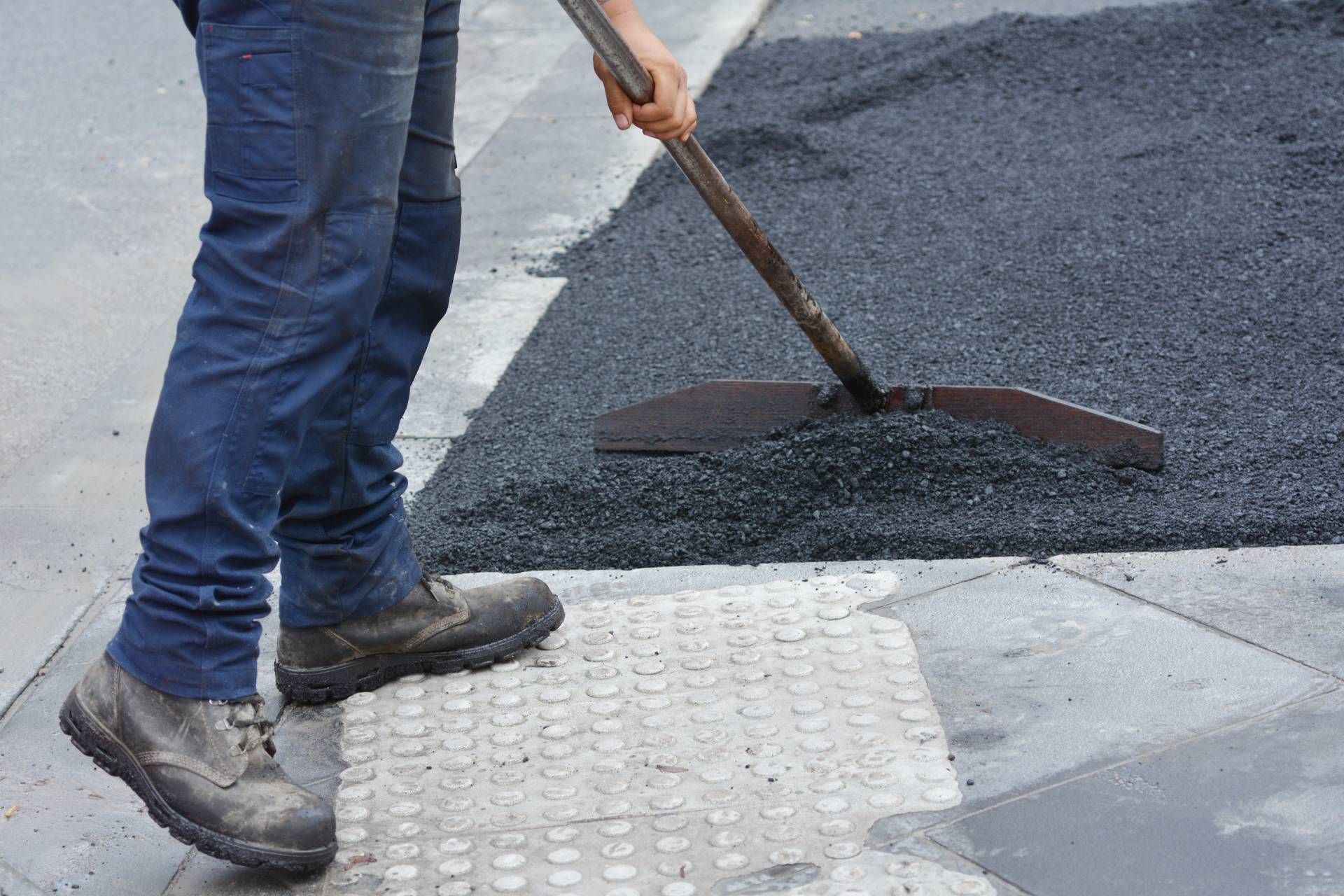 A professional asphalt paving company working on a project near Lexington, Kentucky (KY)