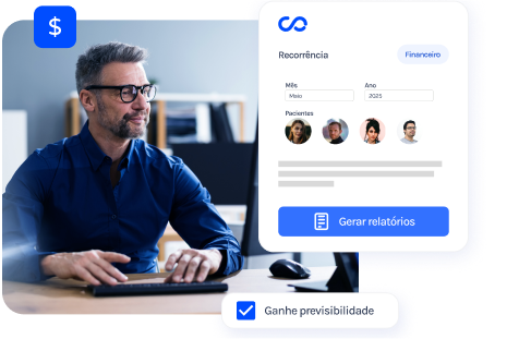 Um homem está sentado em uma mesa usando um computador.