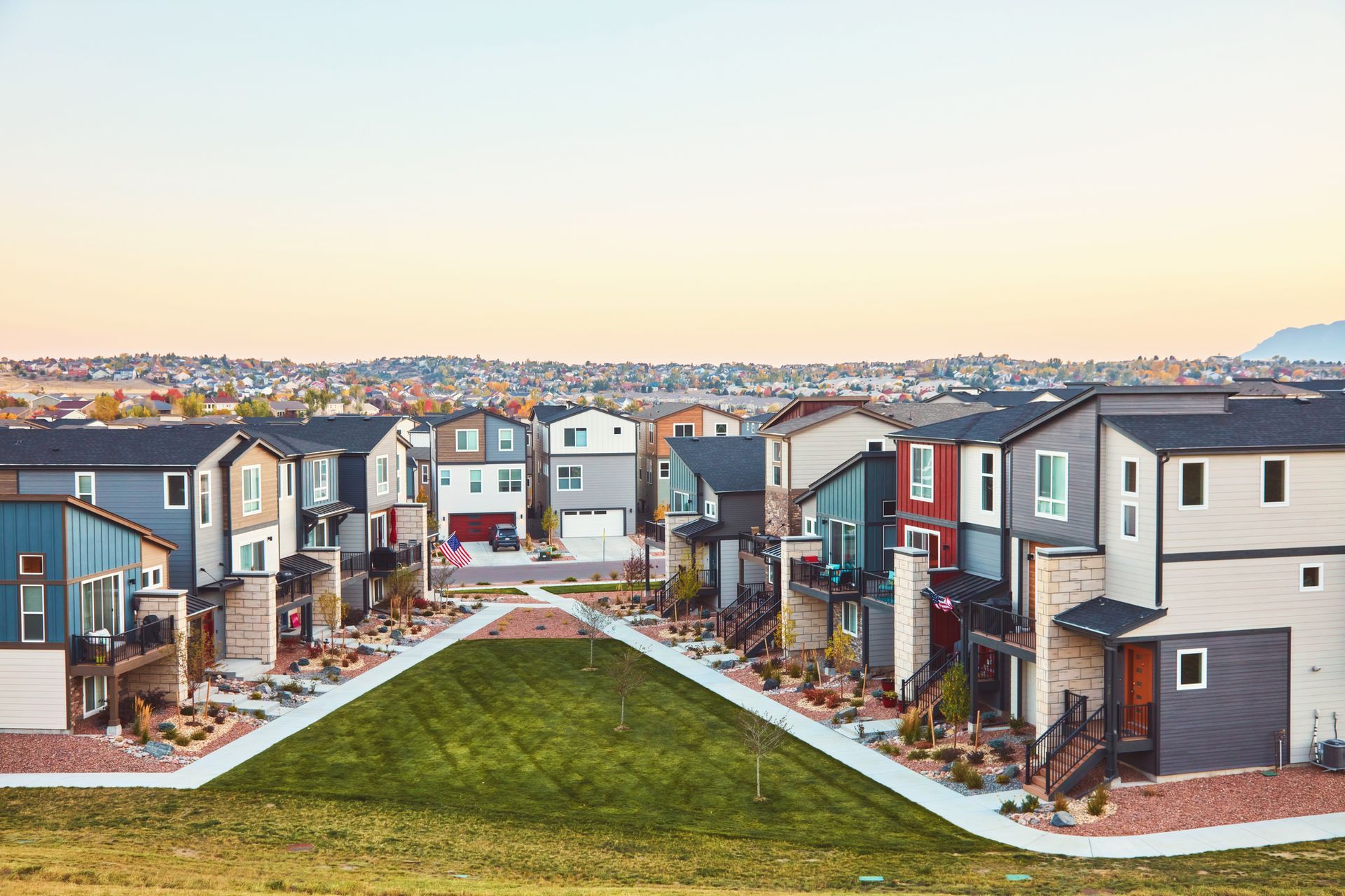 an aerial view of a row of houses in a residential area .