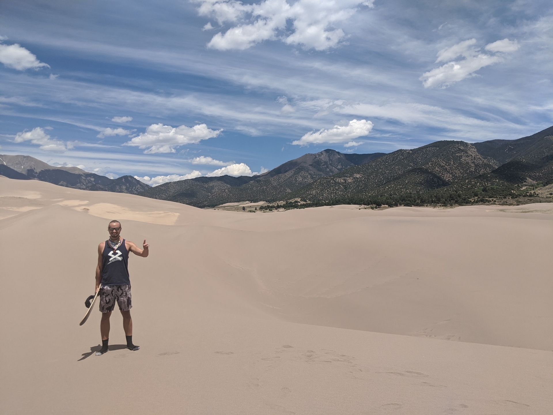 Justin Craddock proving he's the coolest guy in Winnipeg by sand boarding through the Colorado Sand Dunes during the first few months of the pandemic.