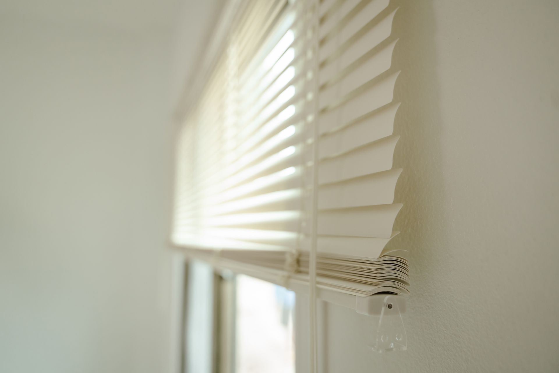 Close-up of window blinds, showcasing a stylish residential window treatment for home décor.