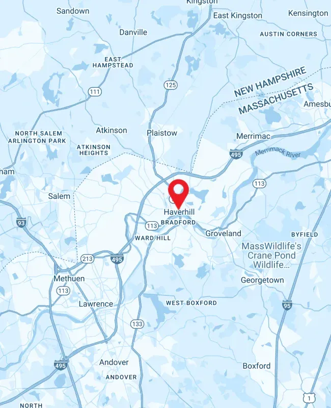 Map of Haverhill, Massachusetts, with surrounding towns and roads in a light blue color.