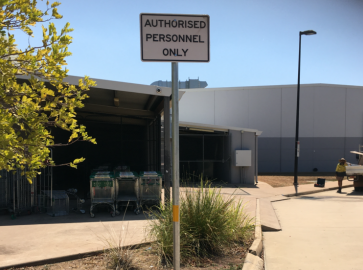 A sign that says authorised personnel only in front of a building