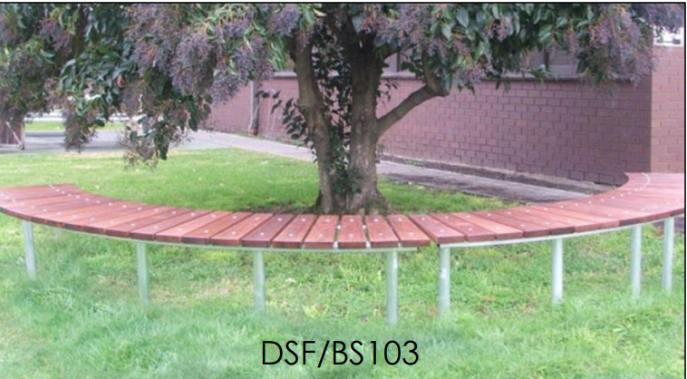 A wooden bench is sitting under a tree in a park.