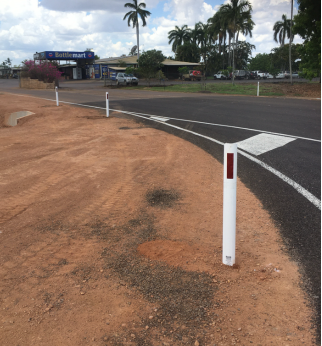 A roadmarking sign on a curved road 