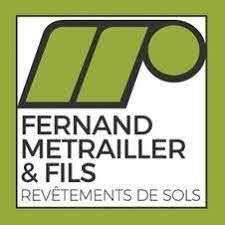 Es ist ein Logo für ein Unternehmen namens Fernand Metrailler & Fils.