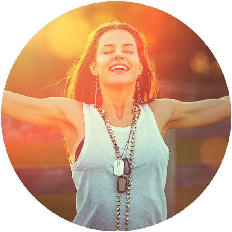 A Woman is Smiling With Her Arms Outstretched in a Circle — Living Well Psychology Clinic in Erina, NSW