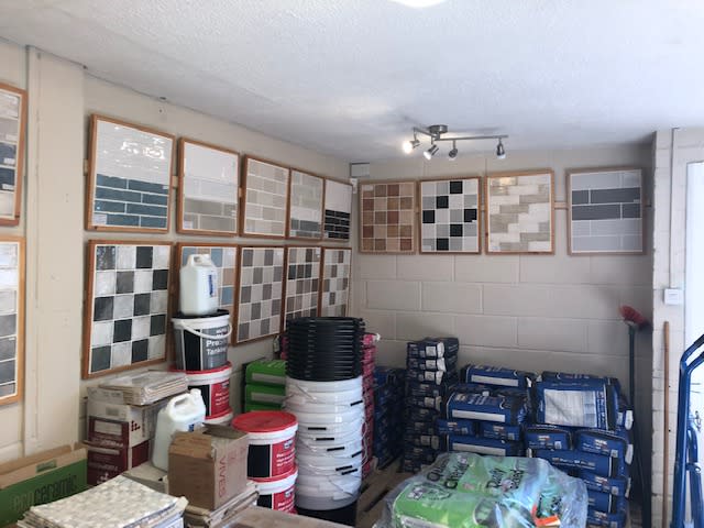 tile samples hung on wall