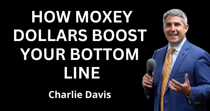 Charlie Davis standing next to text about MOXY dollars