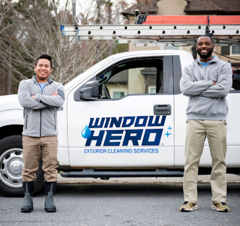 window hero's truck with two service guys