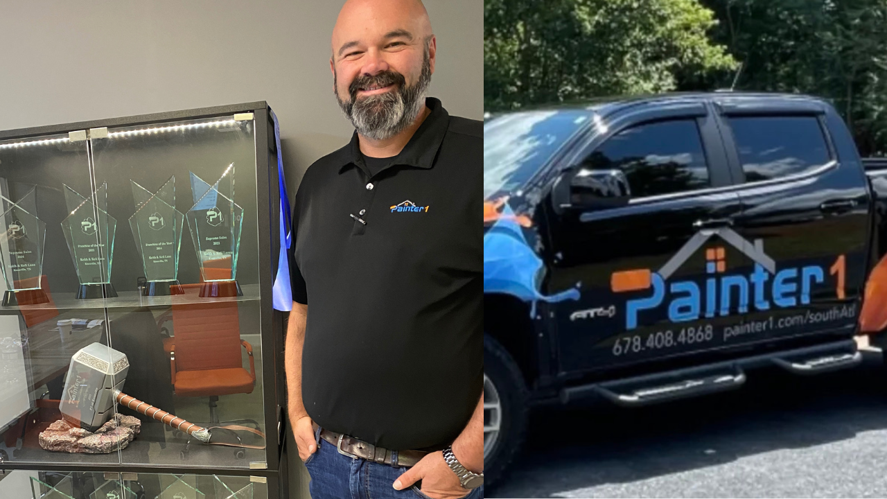 Painter1's top mentor Keith standing next to his trophy case and painter1 truck