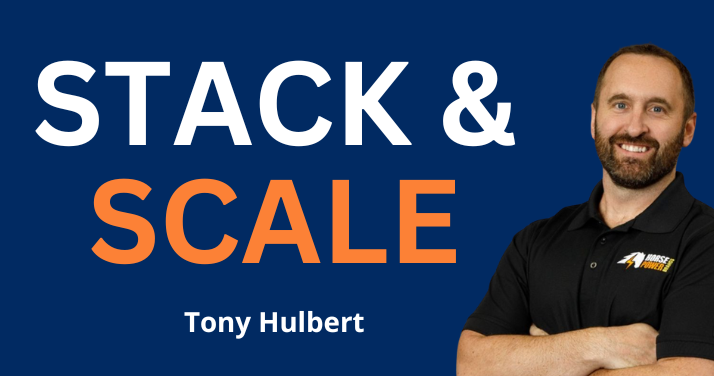 stack & scale copy with man standing next to copy - Tony Hilbert