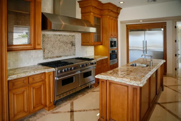 A kitchen with stainless steel appliances and granite counter tops