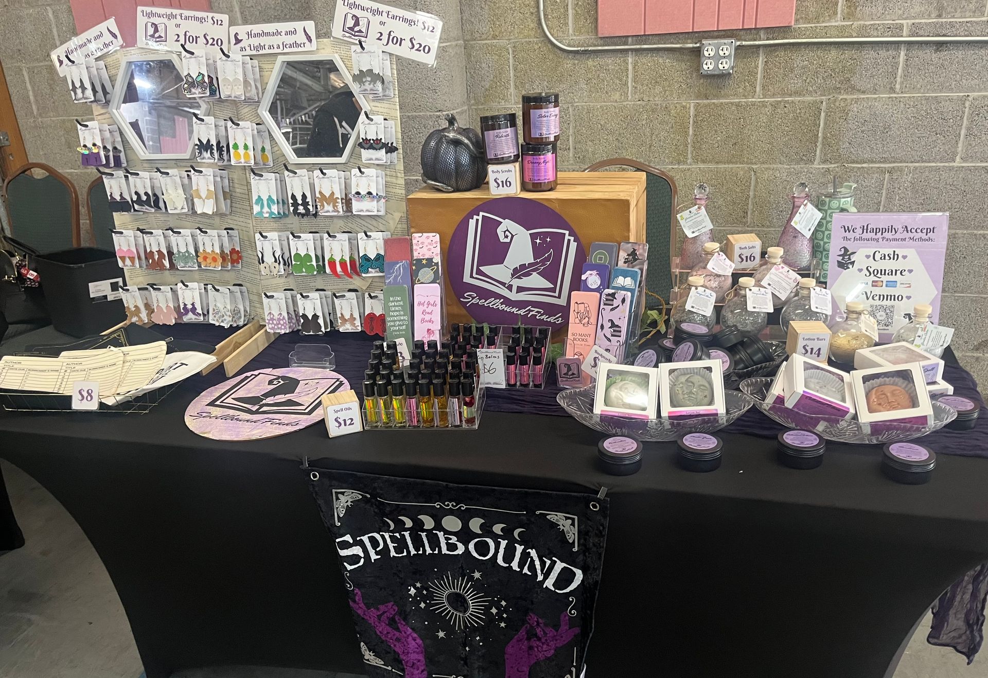 A table with a lot of spellbound finds items on it.