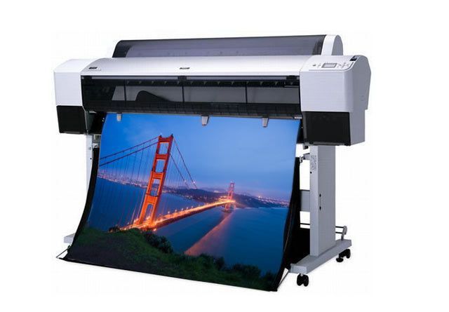 a large printer with a picture of the golden gate bridge on it .