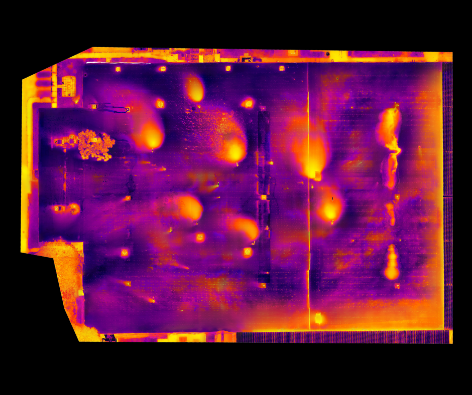 A thermal image of a building with a lot of lights on it.