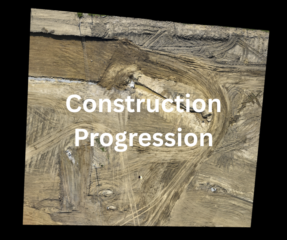 A picture of a construction site with the words construction progression written on it