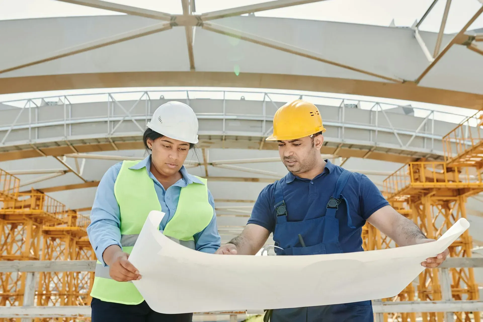 Construction professionals looking at a document
