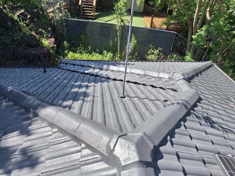 A Roof With a Antenna on It and a Fence in the Background — Roofing Gold Coast in Tallebudgera, QLD