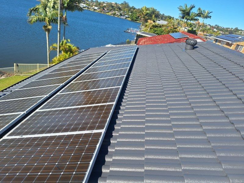 A Roof With a Lot of Solar Panels on It — Roofing Gold Coast in Tallebudgera, QLD