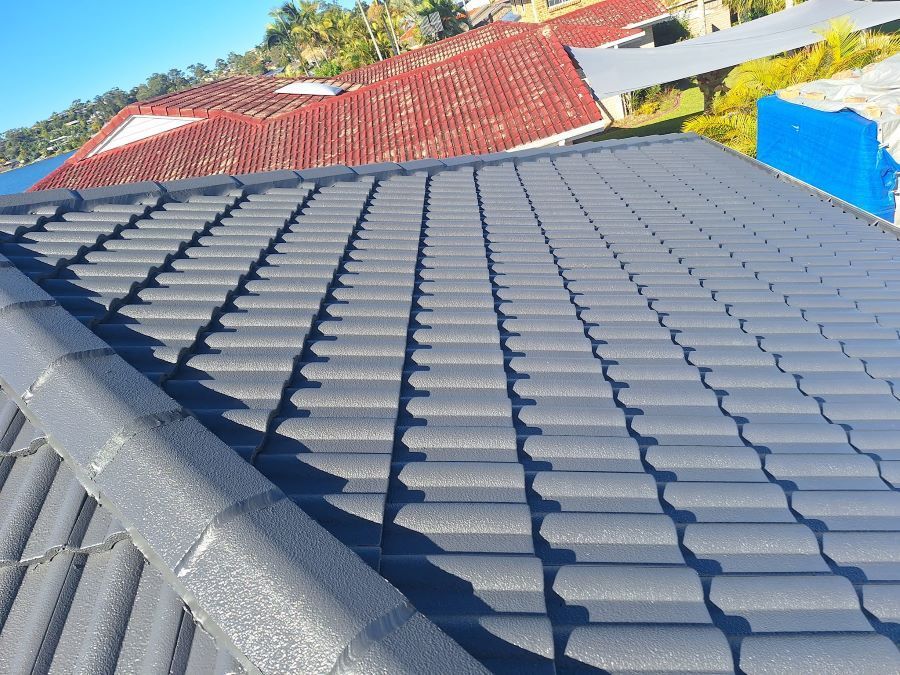A Close Up of a Roof With a Lot of Tiles on It — Roofing Gold Coast in Tallebudgera, QLD