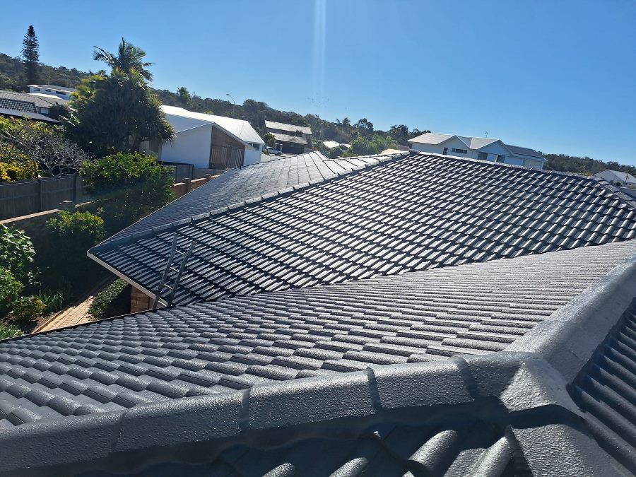 A Close Up of a Roof With a Blue Sky in the Background — Roofing Gold Coast in Tallebudgera, QLD