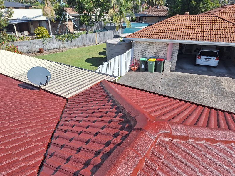 The Roof of a House Has a Satellite Dish on It — Roofing Gold Coast in Tallebudgera, QLD