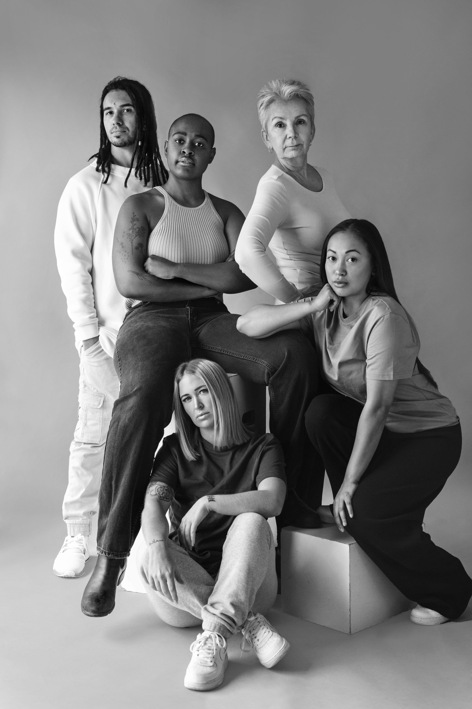 black and white group shot of multicultural people