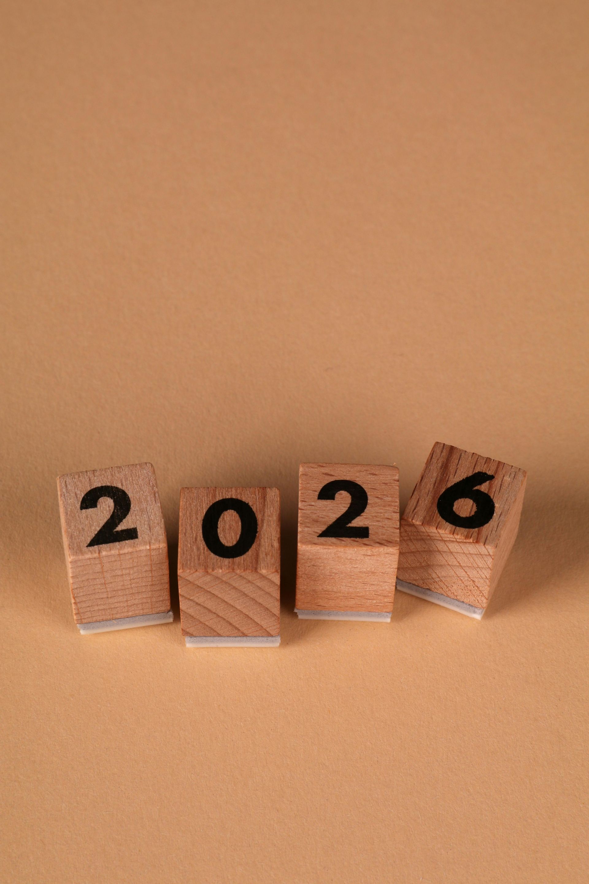 Brick blocks arranged to spell out the number 2026, symbolizing the year ahead and future market outlook