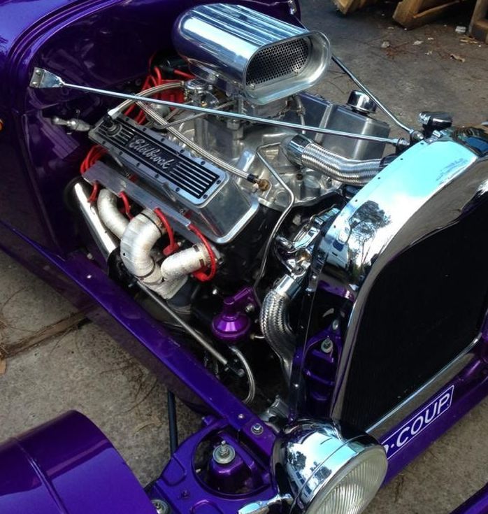 A Close Up of a Purple Car With the Engine Exposed — South Coast Radiators In Liverpool, NSW