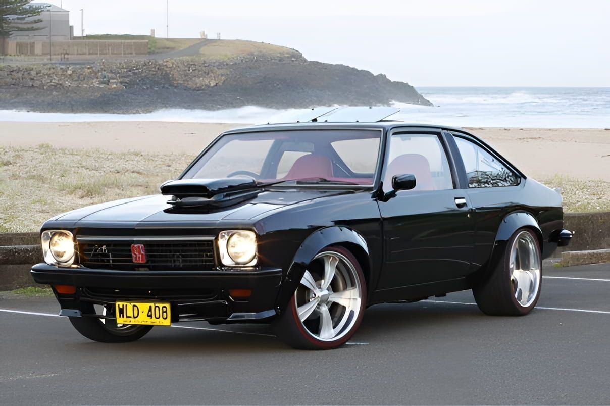 A Black Car With a License Plate That Says Wlp 026 — South Coast Radiators In Shellharbour, NSW