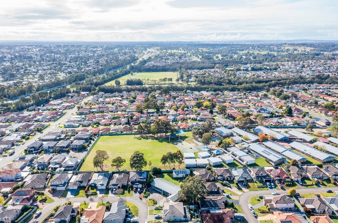 An Aerial View of a Residential Area With Lots of Houses and a Park — South Coast Radiators In Liverpool, NSW