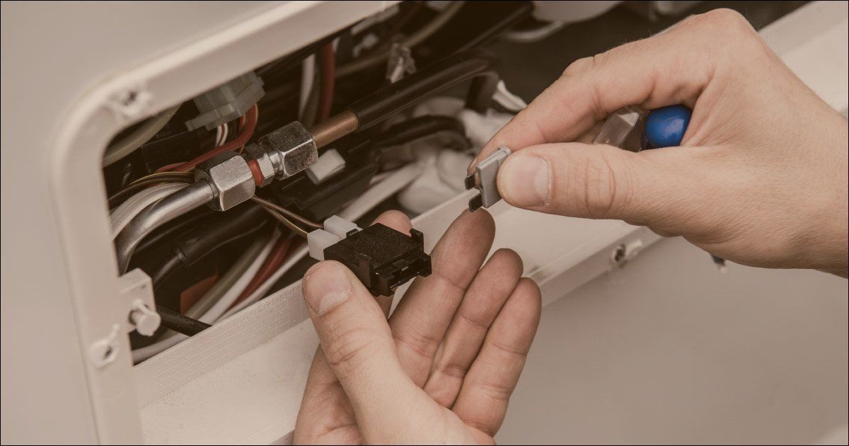 an rv electrical box being worked on