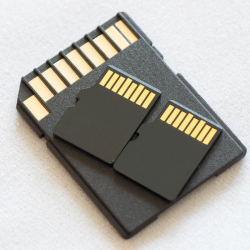three black SD cards