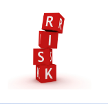 four red dice with a letter on each dice displaying the word risk in white letters