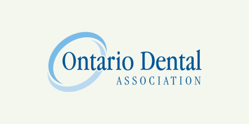 The ontario dental association logo is blue and white.