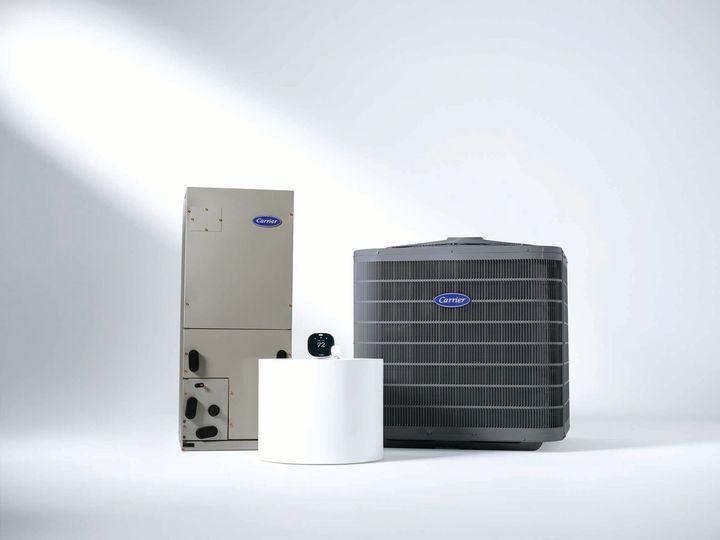 Gray Carrier air conditioning unit outdoors.