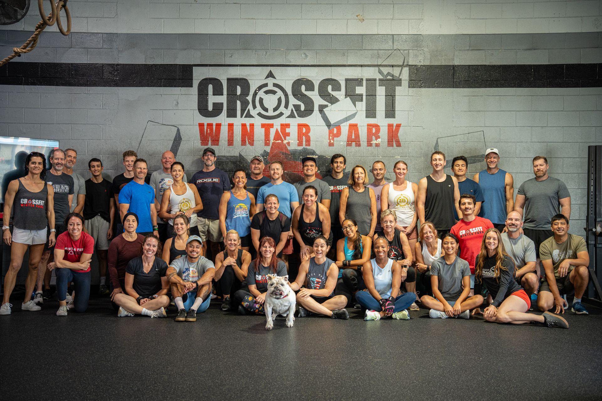 A group of people are posing for a picture at the best gym in Winter Park, FL