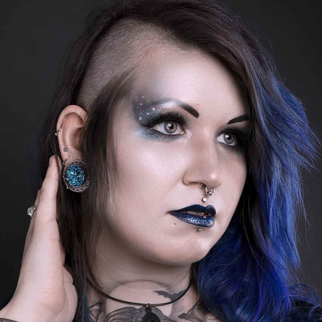 Woman with piercing and tattoo