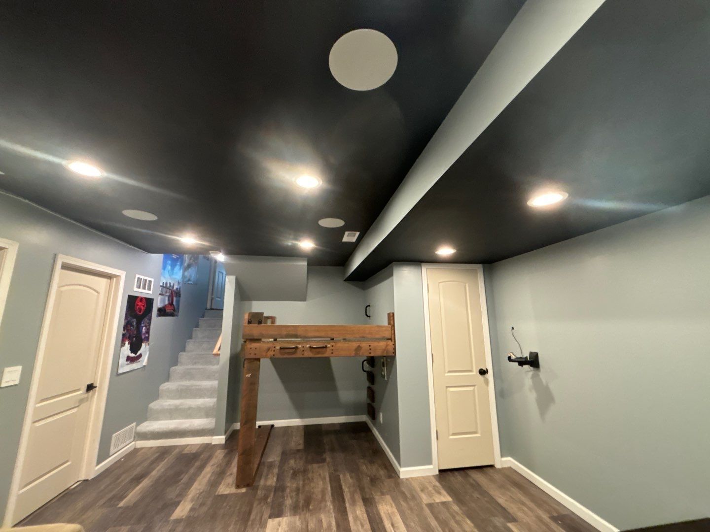 There is a bunk bed in the corner of the room.