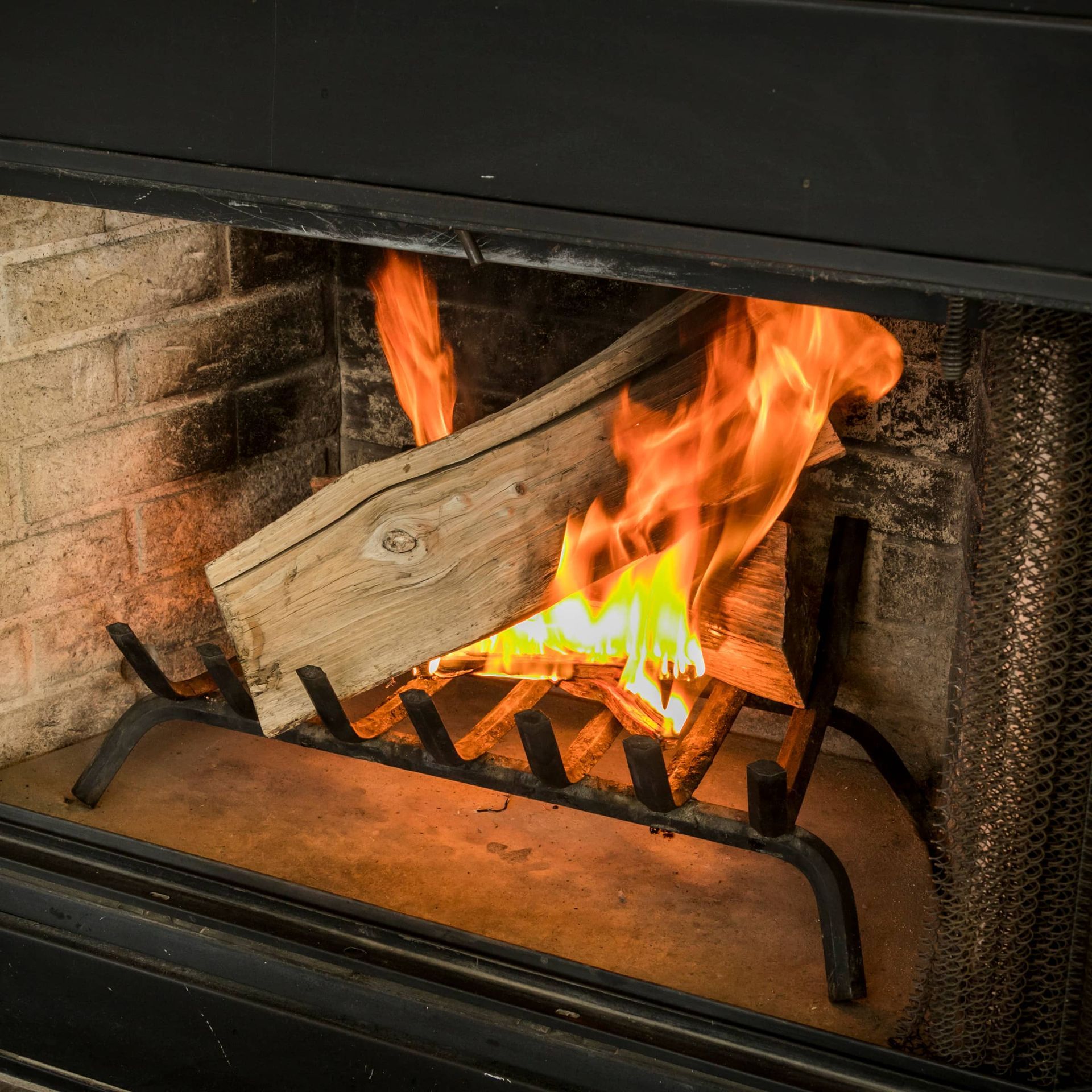 a wood fire lit using duraflame fatwood kindling sticks