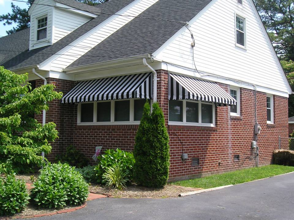 House with Striped Metal Canopy — Norfolk, VA — Hustead's Canvas Creations