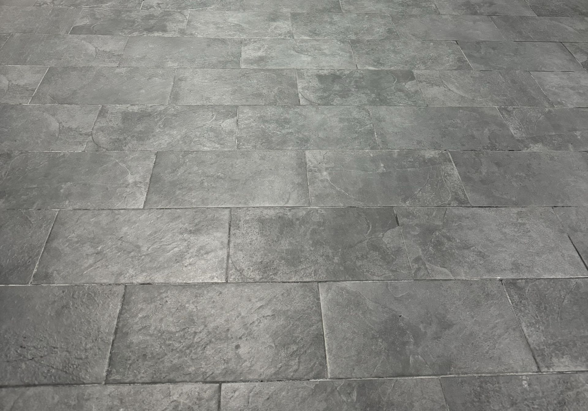 Gray stone tile flooring.